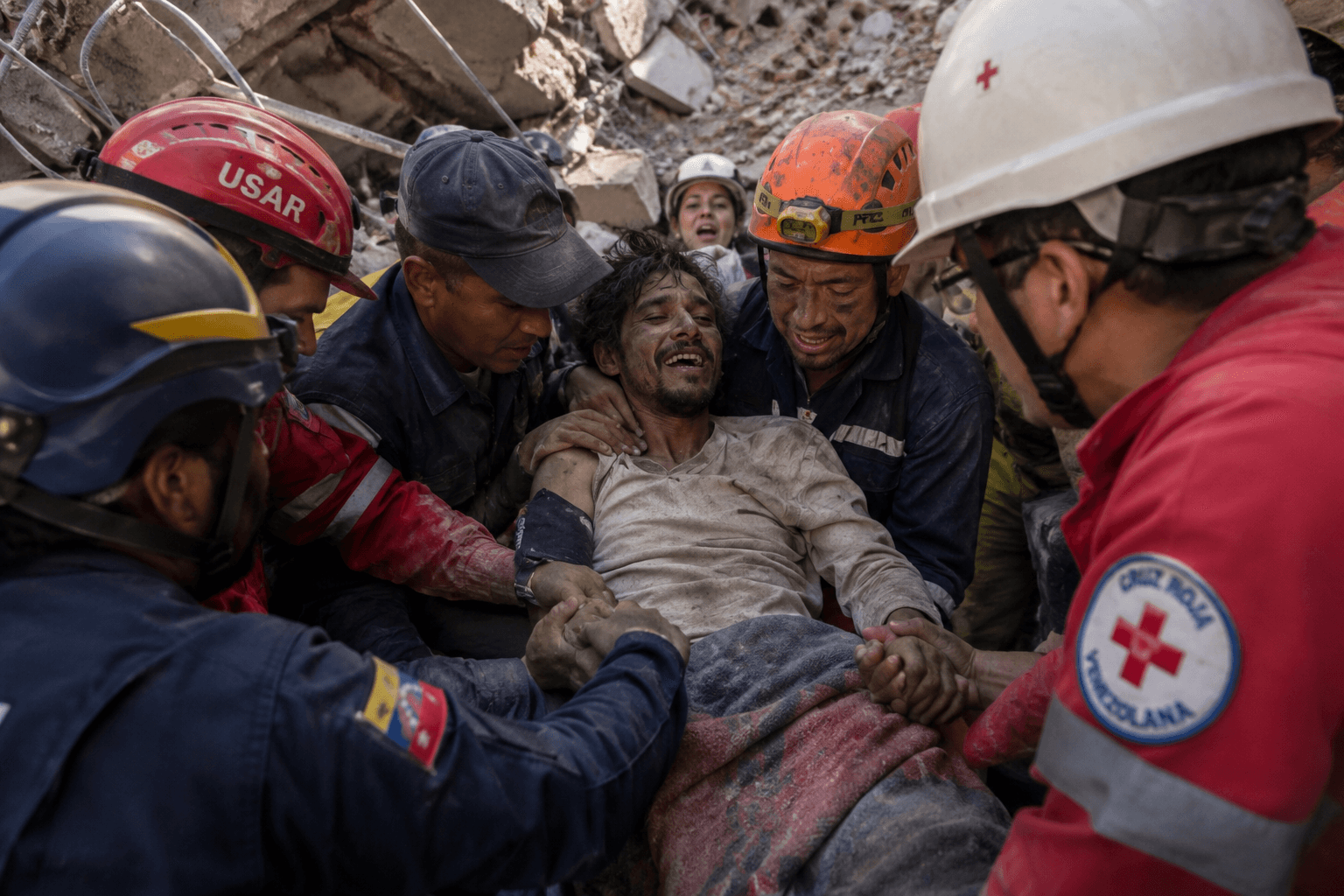 Venezuela quake survivor pulled out alive after eight days